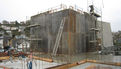 Chantier du pôle Max Jacob : Dernière rehausse de la cage d’ascenseur du Novomax. On surplombe à présent les toits du quartier. Le 3 mars 2014 